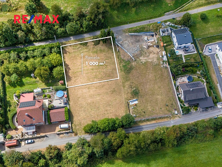 Prodej stavebního pozemku 1 000 m² - foto 1