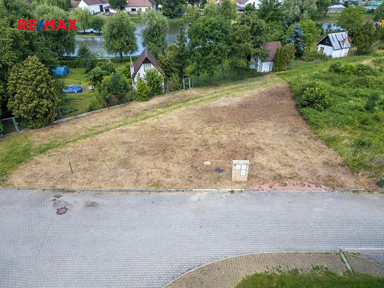 Prodej stavebního pozemku 695 m² - foto 7