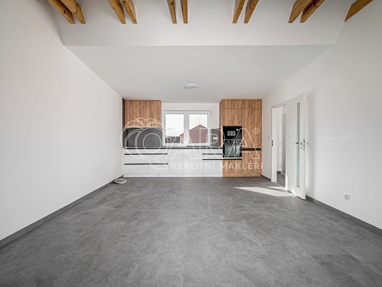 Prodej bytu 2+kk 64 m² (Podkrovní) - foto 1