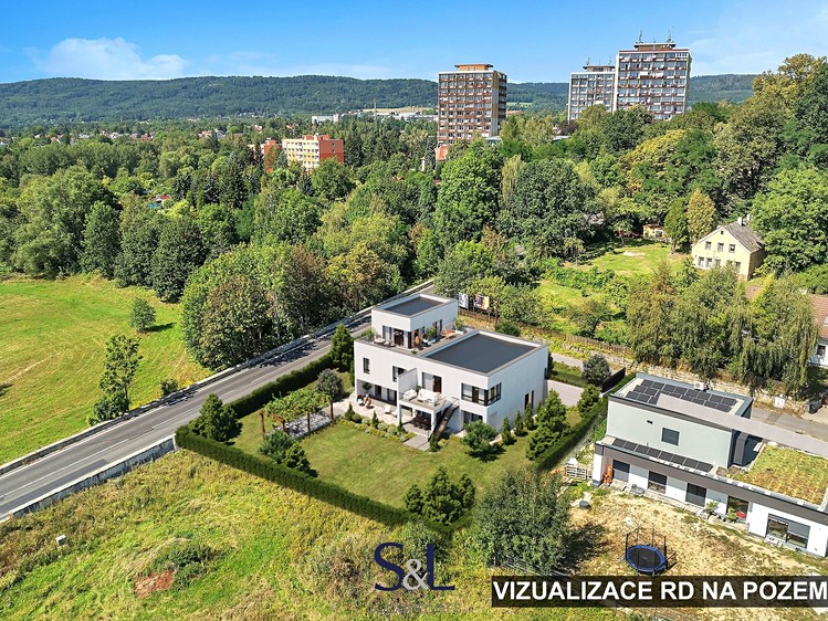 Prodej stavebního pozemku 989 m² - foto 1