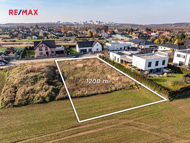 Prodej stavebního pozemku 1 208 m² - foto 1