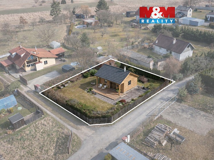 Prodej stavebního pozemku 619 m² - foto 1