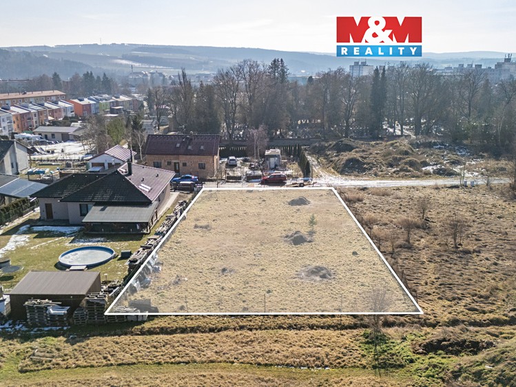 Prodej stavebního pozemku 900 m² - foto 1