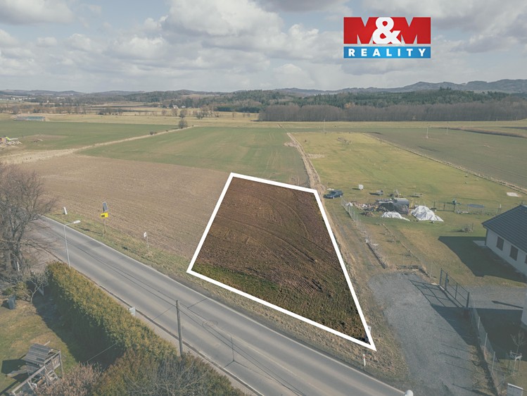 Prodej stavebního pozemku 1 353 m² - foto 1