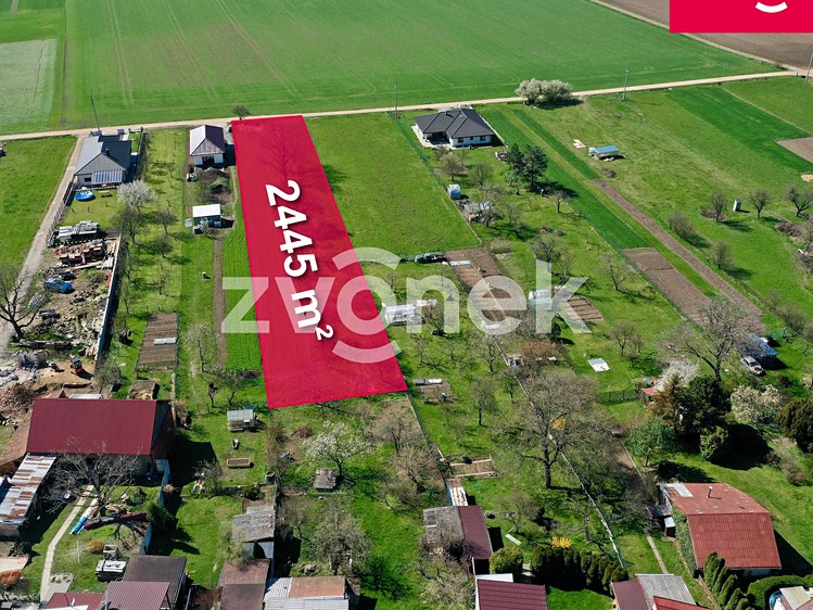 Prodej stavebního pozemku 2 445 m² - foto 1