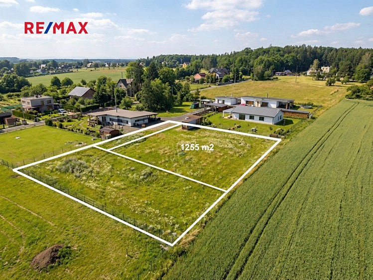 Prodej stavebního pozemku 1 255 m² - foto 1
