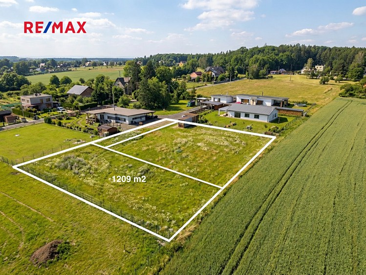 Prodej stavebního pozemku 1 209 m² - foto 1