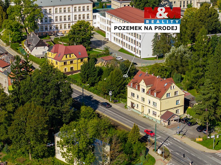Prodej stavebního pozemku 1 061 m² - foto 1