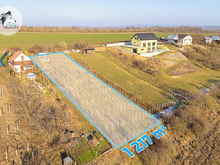 Prodej stavebního pozemku 1 217 m² - foto 1