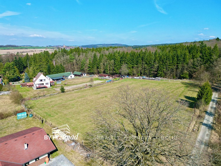 Prodej stavebního pozemku 6 975 m² - foto 1