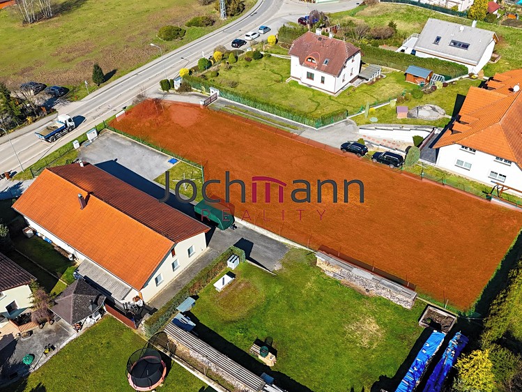 Prodej stavebního pozemku 1 253 m² - foto 1