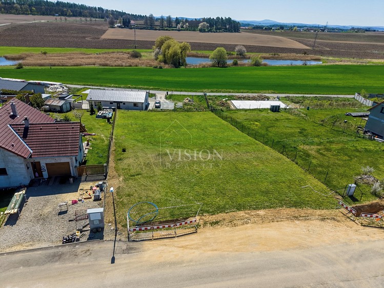 Prodej stavebního pozemku 1 233 m² - foto 2