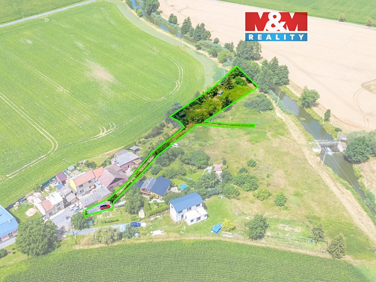 Prodej stavebního pozemku 1 718 m² - foto 1