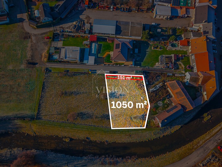 Prodej stavebního pozemku 1 050 m² - foto 1
