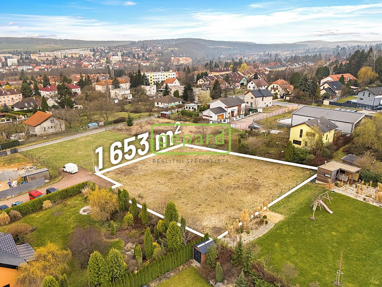 Prodej stavebního pozemku 1 653 m² - foto 1