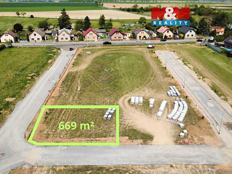 Prodej stavebního pozemku 669 m² - foto 1