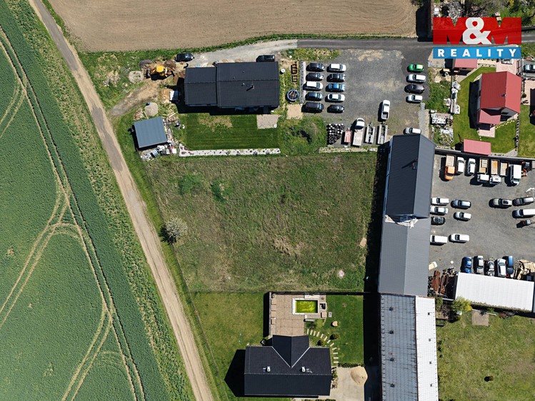 Prodej stavebního pozemku 900 m² - foto 2