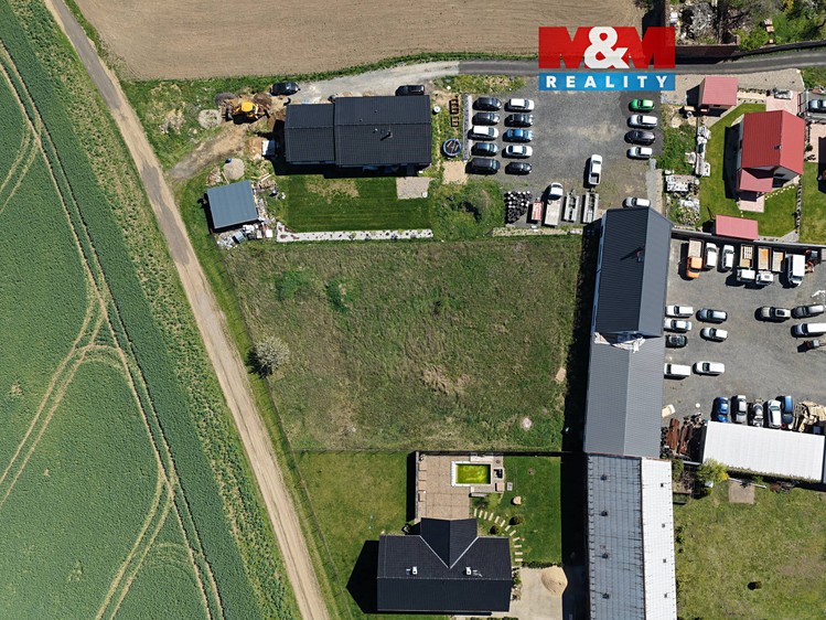 Prodej stavebního pozemku 1 732 m² - foto 1
