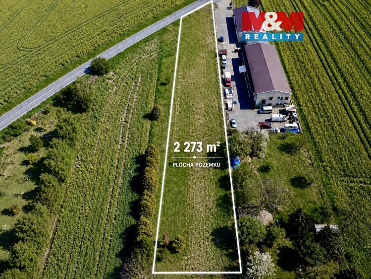 Prodej stavebního pozemku 2 273 m² - foto 1