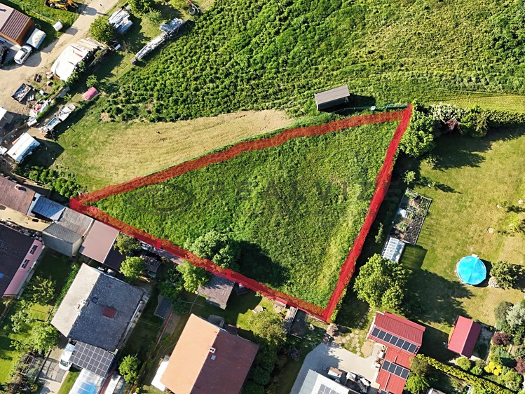 Prodej stavebního pozemku 1 203 m² - foto 1