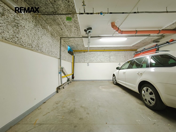 Prodej garážového stání 14 m² - foto 1