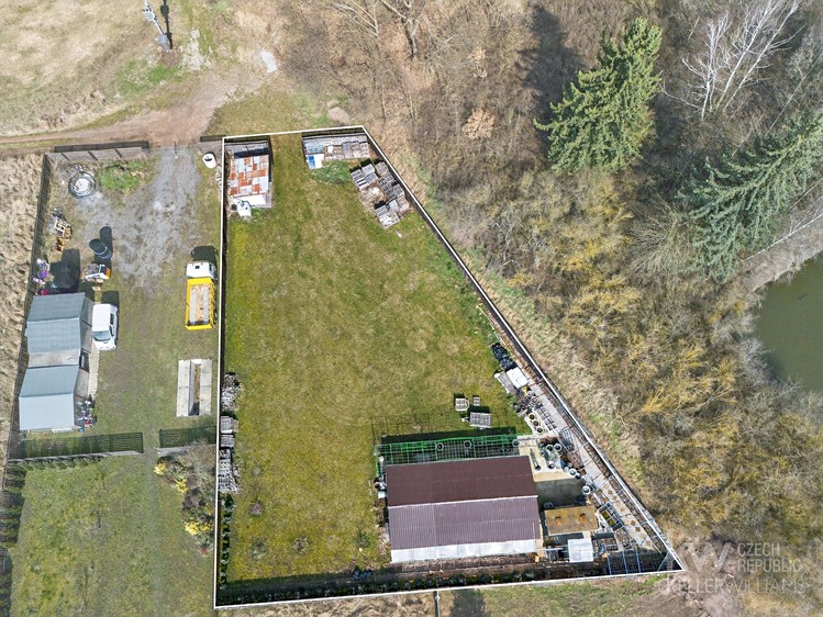 Prodej stavebního pozemku 1 453 m² - foto 1