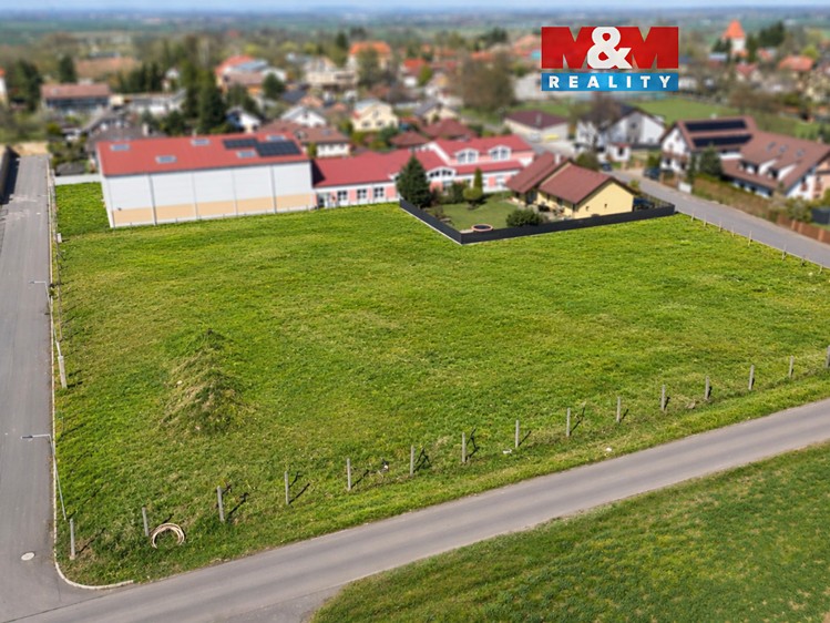 Prodej stavebního pozemku 4 973 m² - foto 1