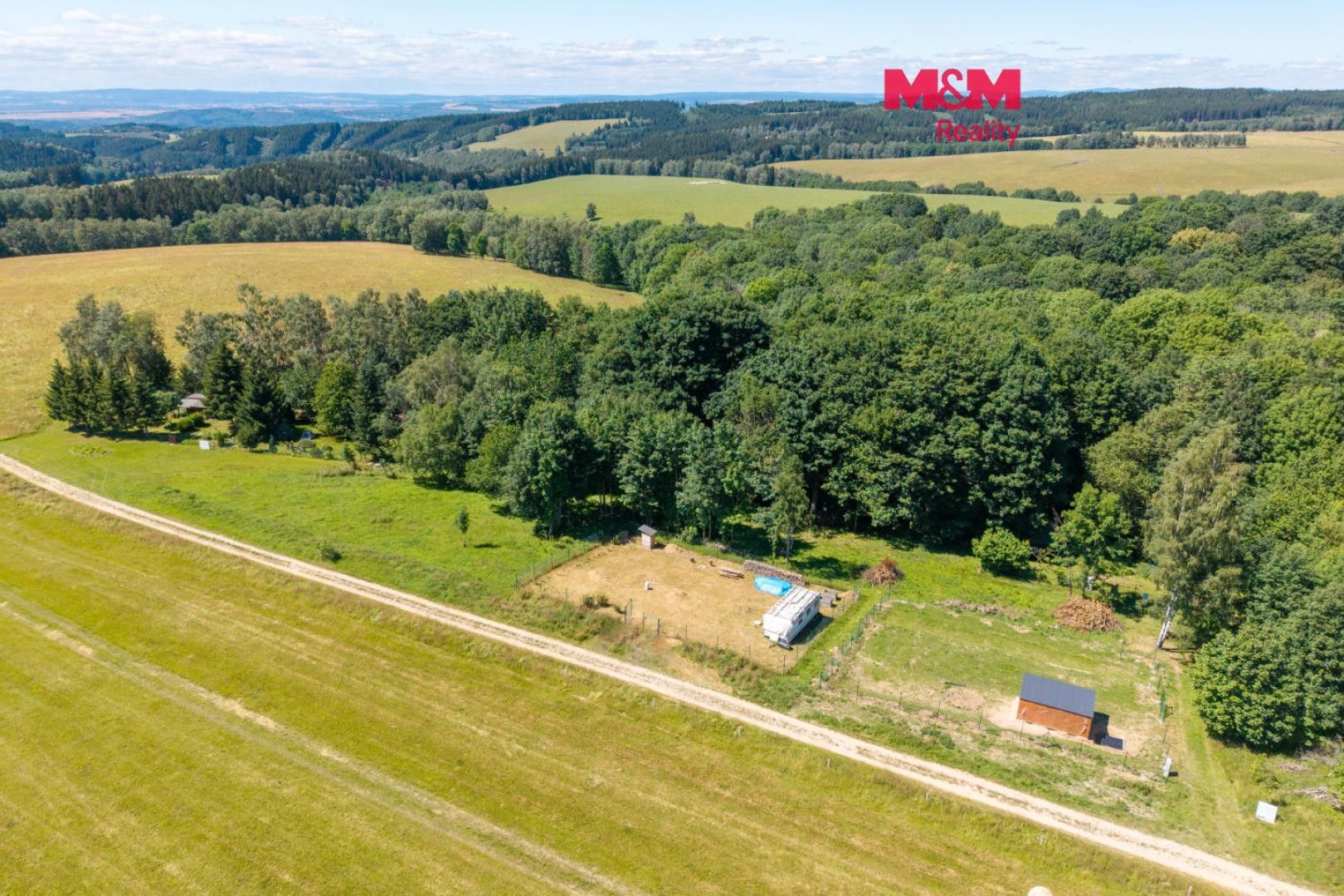 Prodej pozemku 570 m² - foto 1