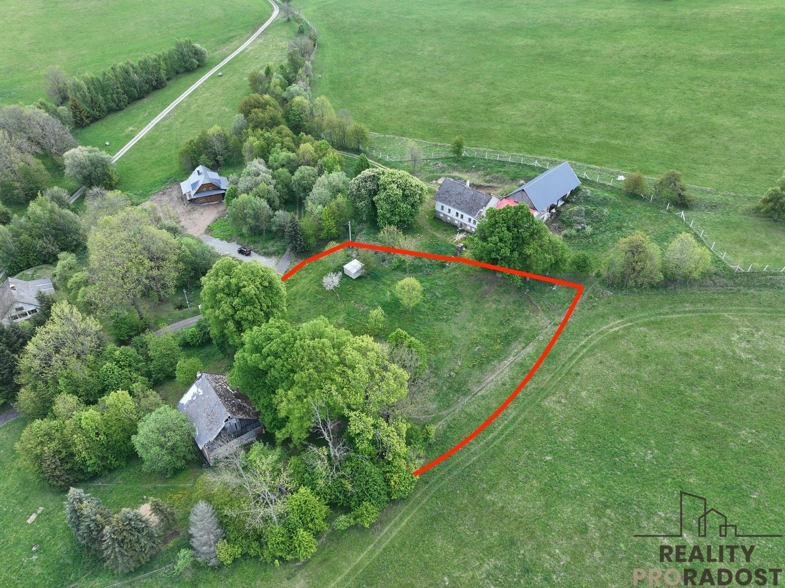Prodej pozemku 1669 m² - foto 1