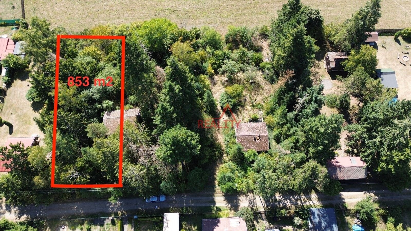 Prodej pozemku 853 m² - foto 1