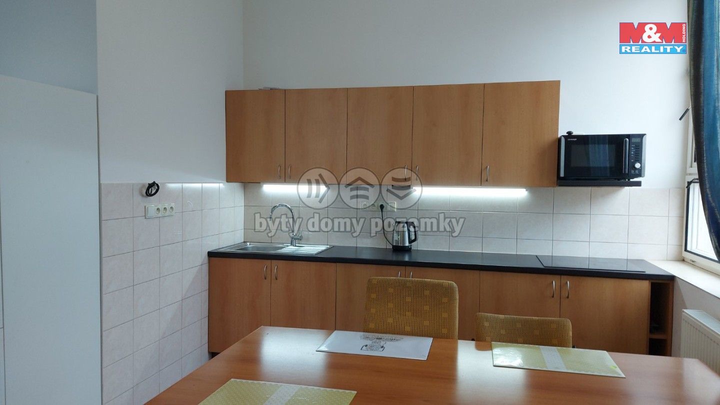 Pronájem bytu 1+1 85 m² - foto 1